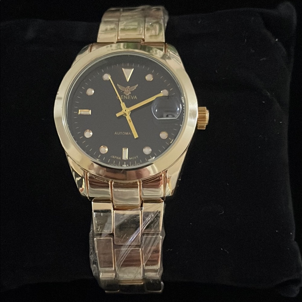 Gold and Black Geneva Watch